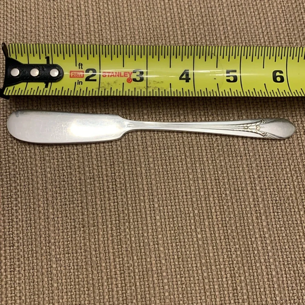 Vintage silver spreader knives